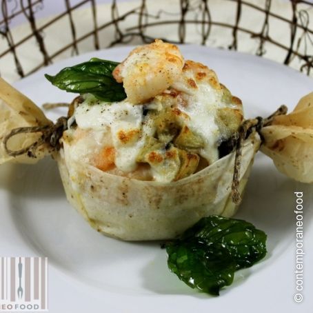 Risotto di scampi al cartoccio con melanzane e mozzarella